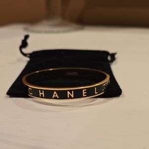 Elegant Gold And Black Bracelet With Chanel Logo
